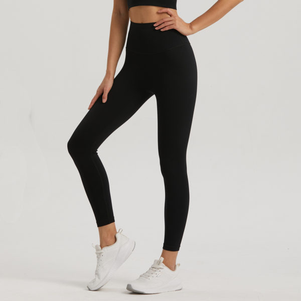 High-Waist Leggings, Pocket Fitness Fashion, Nine-Point Activewear, Trendy Workout Bottoms.