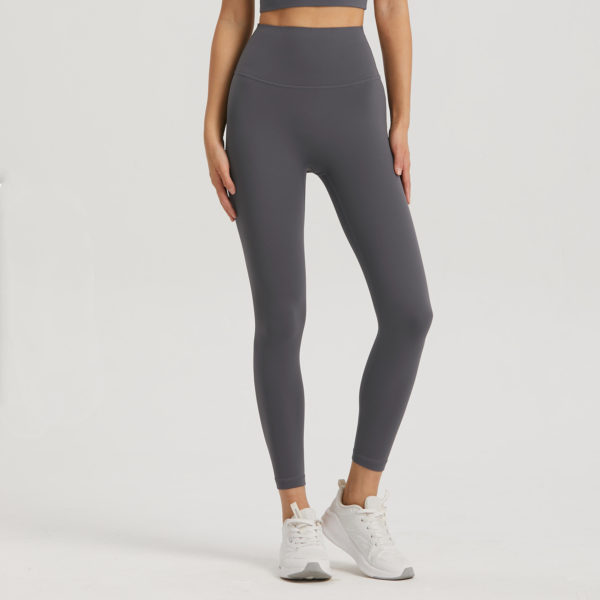 High-Waist Leggings, Pocket Fitness Fashion, Nine-Point Activewear, Trendy Workout Bottoms.