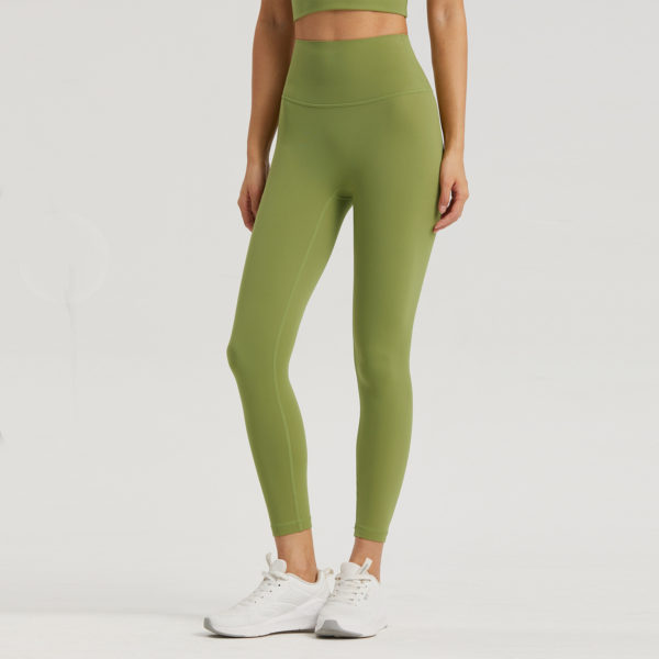 High-Waist Leggings, Pocket Fitness Fashion, Nine-Point Activewear, Trendy Workout Bottoms.